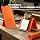 2026 New Flexible Silicone Aluminum Phone Stand Bendable Freely into Any Shape, Universal Adjustable Anti-Slip Desktop Mount for Home Office Travel (Orange)